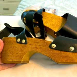 Lulu black leather wooden clog sandals with a buckle adjustable ankle strap